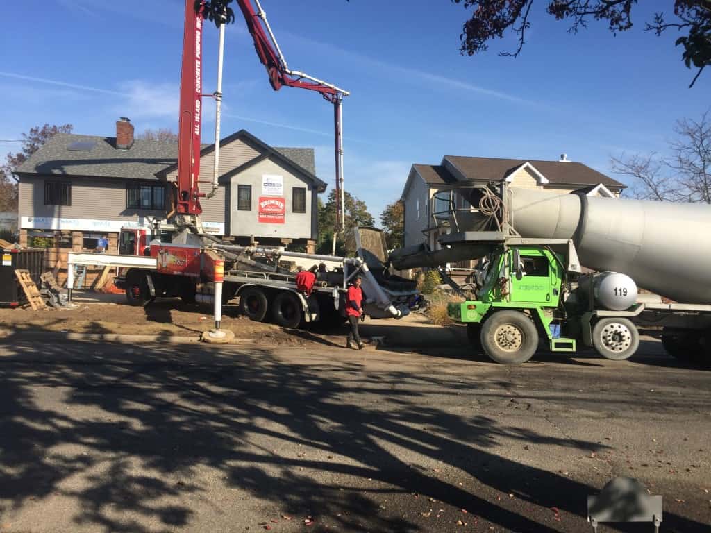 pumping concrete with boom truck
